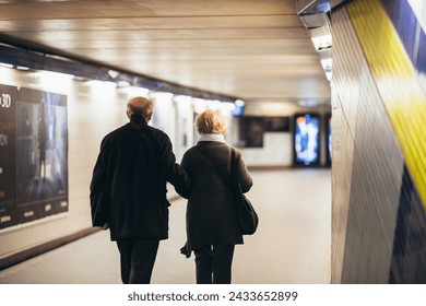 
A couple walking happily on the Paris subway metro - Powered by Shutterstock