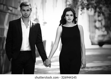 Couple Walking On The Street