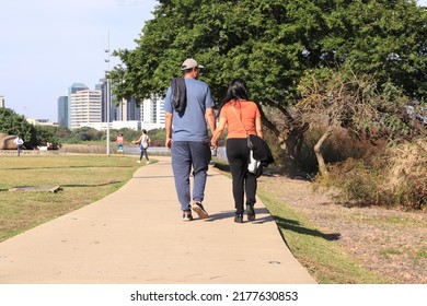 Couple Walking In Guaíba Park In Porto Alegre City, Brazil.