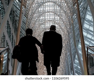 Couple Walking Up Stairs