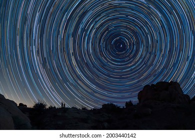 Couple Watching Circle Of Stars