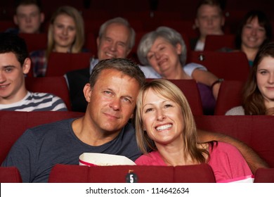 Couple Watching Film In Cinema