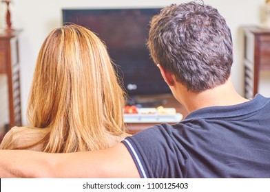 Couple Watching Having A Movie Night At Home