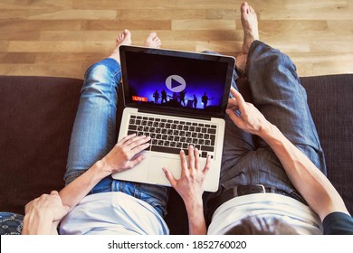 Couple Watching Live Streaming Online Concert At Home