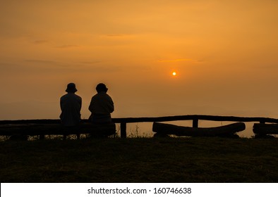 Couple watching sunrise