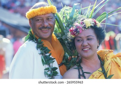 A Couple Wearing Polynesian Costumes For Hawaiian Unity Day, Ho' Olokahi, HI