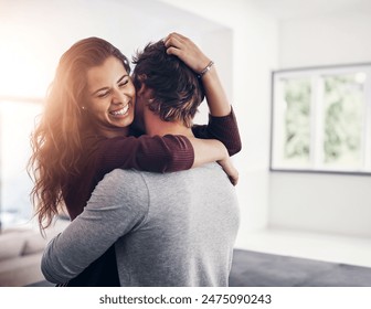 Couple, woman hug and laughing in home kitchen with love, bonding and smile together with joy. Embrace, romance and happy people with marriage with care, trust and commitment in house with fun joke - Powered by Shutterstock