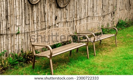 couple wooden bench in the yard