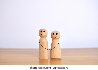 Couple Wooden Puppet Family Relationship Symbol. New Married Life Living Concept.