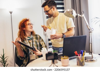 Couple Working At Home Eating Chinese Food Ordered Online.