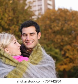 Couple Wrapped In Blanket
