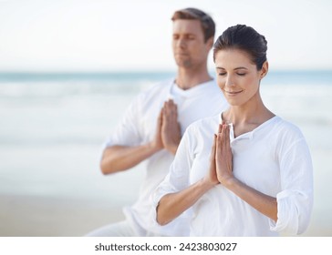 Couple, yoga and ocean with meditation, peace and sitting on sand in morning with mindfulness in summer. Man, woman and outdoor for namaste with spiritual growth, balance or zen at beach in Cape Town - Powered by Shutterstock