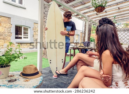 Beautiful women having fun in a surf class