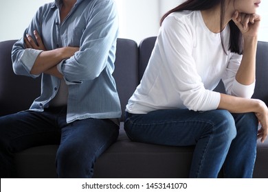 Couples are bored, stressed, upset and irritated after quarreling. Family crisis and relationship problems that come to an end - Shutterstock ID 1453141070