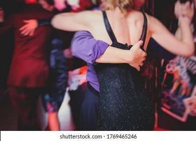 Couples Dancing Argentinian Dance Milonga In The Ballroom, Tango Lesson In The Red Lights, Dance Festival