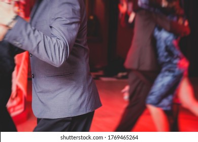 Couples Dancing Argentinian Dance Milonga In The Ballroom, Tango Lesson In The Red Lights, Dance Festival