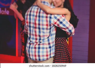 Couples Dancing Traditional Latin Argentinian Dance Milonga In The Ballroom, Tango Salsa Bachata Lesson In The Red Lights, Dance Festival
