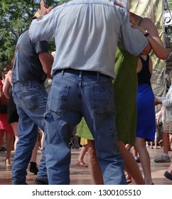 Couples Dancing To Zydeco Blues Music  At The  4th Of July Weekend Blues Festival In  Portland,  Oregon