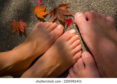 Couple's Feet, Asian Woman And Western Man, Autumn, Japan