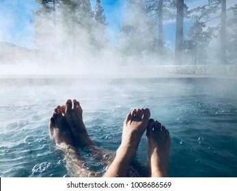 Couples Feet In Hot Tub Jacuzzi Spa Outdoors With Mist Romantic Getaway