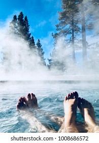 Couples Feet In Hot Tub Jacuzzi Spa Outdoors With Mist Romantic Getaway