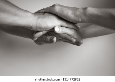 Couples Hands Coming Together. In Unity There Is Strength Concept. 