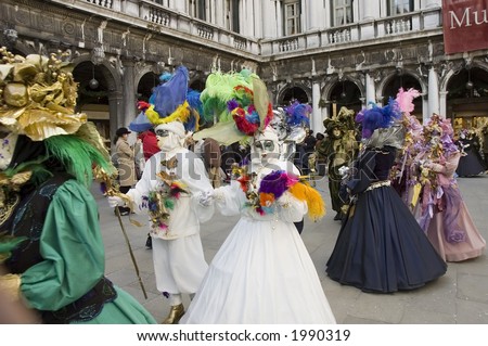 couples prepare to have a parade for carnivale in venice,Italy.Mardi Gras of europe