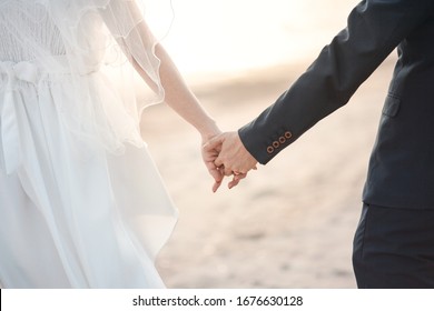
Couples shake hands at the wedding To show love on the wedding day