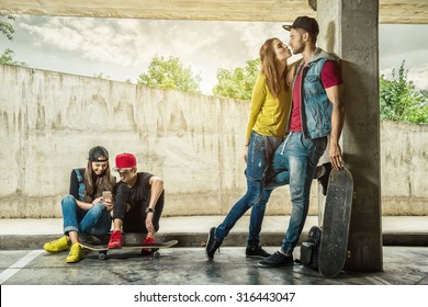 Couples skate the parking garage - Powered by Shutterstock