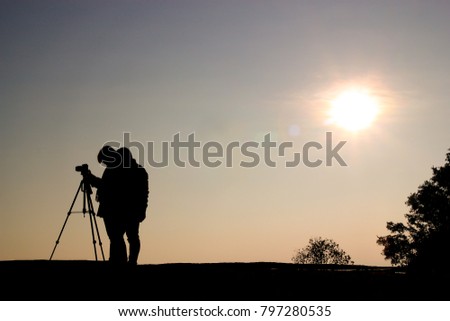 Similar – Silhouette der Fotografen auf den Bergen