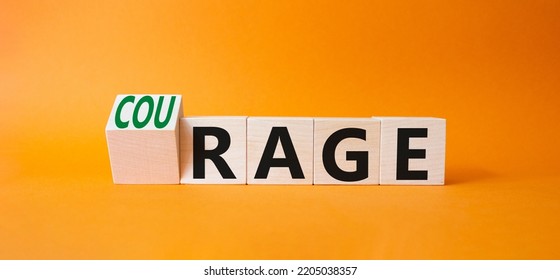 Courage And Rage Symbol. Turned Wooden Cubes With Words Rage And Courage. Beautiful Orange Background. Business Concept. Copy Space.