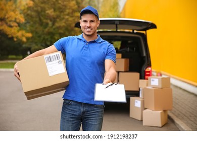Courier with clipboard and parcel near delivery van outdoors. Space for text
