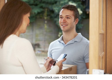 Courier Delivering Package To Domestic House - Powered by Shutterstock