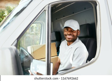 Courier Delivery. Black Man Driver Driving Delivery Car 