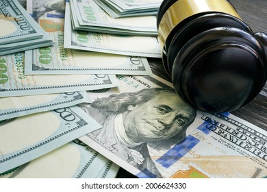 Court Gavel On The Money As Symbol Of Bribes, Fines And Sanctions.