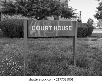 A Court House Sign In Black And White.