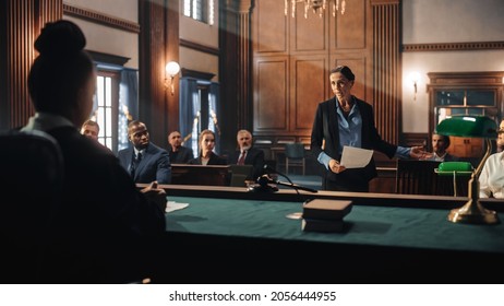 Court of Justice and Law Trial: Female Public Defender Presenting Case, Making Passionate Speech to Judge, Jury. Multiethnic Attorney Lawyer Protecting Client's Innocents with Supportive Evidence.