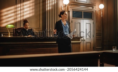 Court of Justice and Law Trial: Successful Female Public Defender Presenting the Case, Making Passionate Speech to Judge, Jury. Attorney Lawyer Protecting Client with Closing Not Guilty Arguments.