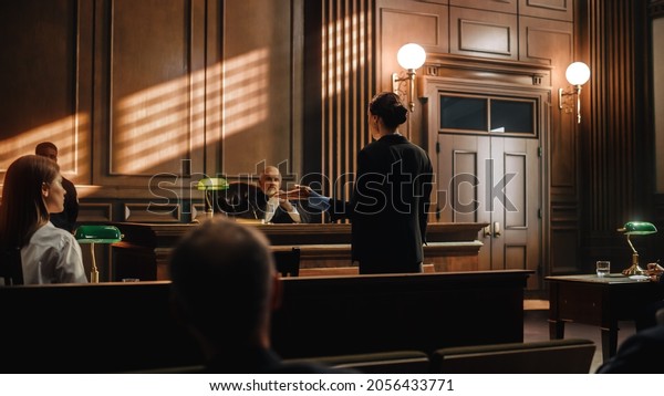 Court of Justice and Law Trial: Successful\
Female Prosecutor Presenting the Case, Making Passionate Speech to\
Judge, Jury. Attorney Lawyer Protecting Client with Closing Not\
Guilty Arguments.