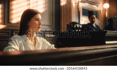 Court of Law and Justice Trial: Portrait of Beautiful Female Witness Giving Evidence to Prosecutor and Defence Counsel, Judge and Jury Listening. Dramatic Speech of Empowered Victim against Crime.