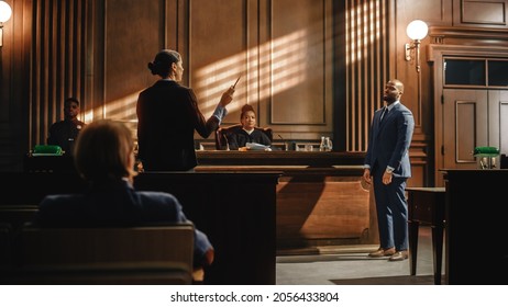 Court of Law Trial in Session: Charismatic Male Public Defender Making Touching, Passionate Speech to Judge and Jury. Female Prosecutor Objecting to His Arguments and Delivering Her Accusations.