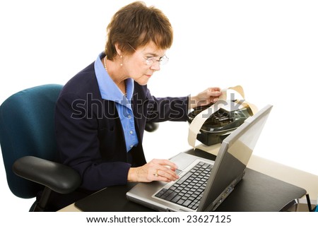 Court reporter typing up the court transcript on her laptop computer.  Isolated on white.