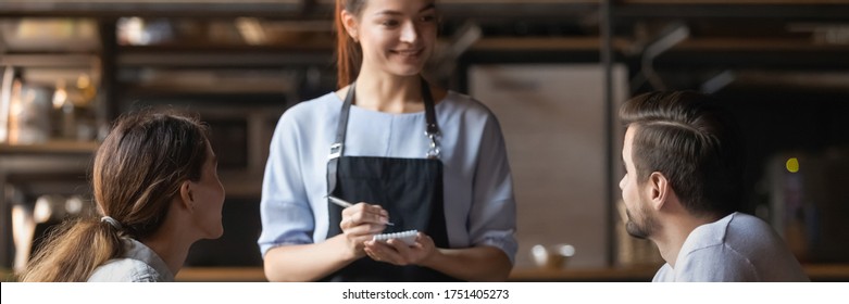 Courteous Waitress, Small Business Owner Holding Notepad Ready Take Restaurant Visitors Order Couple. Eating In Public Places, Good Service Concept. Horizontal Photo Banner For Website Header Design