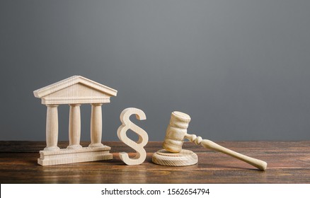 Courthouse, Gavel And A Paragraph Symbol. International Court. Protection Of Business Interests And Human Rights. Intellectual Property. Justice And Legitimacy. Lawmaking. Judicial System