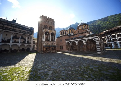 Courtyard, Church of the Nativity and Hrelyo's Tower, Rila Monastery, UNESCO World Heritage Site, nestled in the Rila Mountains, Bulgaria, Europe