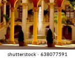 courtyard scene with roman columns and water feature