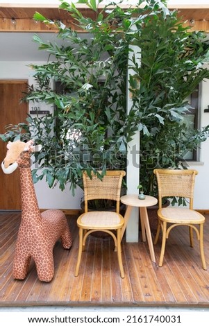 Similar – Woman holding vase with flowers