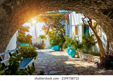 Courtyard of the Theotokos Monastery also known as Paleokastritsa Monastery, Corfu, Greece. Theotokos Monastery, Paleokastritsa town. Monastery of Virgin Mary, Paleokastritsa, Corfu, Greece. - Powered by Shutterstock