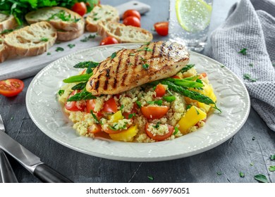 Couscous Salad With Grilled Chicken And Asparagus On White Plate. Healthy Food