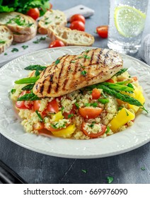 Couscous Salad With Grilled Chicken And Asparagus On White Plate. Healthy Food